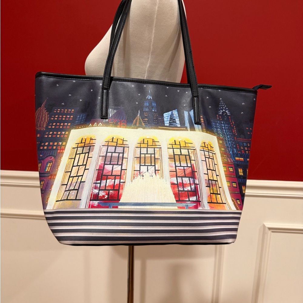 The MET tote bag; 18W x 12H x 7D. Manmade materials.